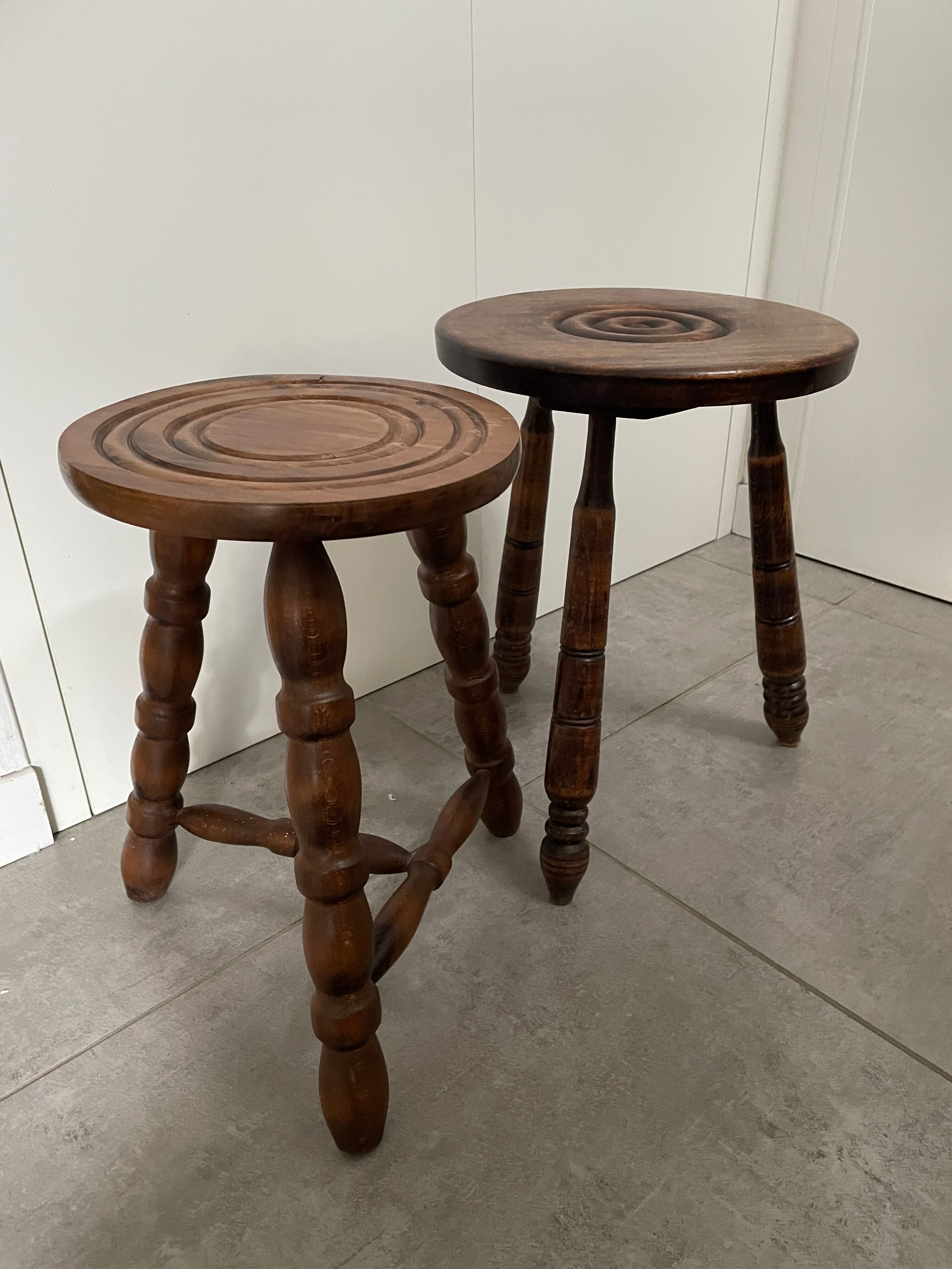 Set of two tripod stools in turned wood