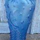 Blue glass decanter with a moon star motif