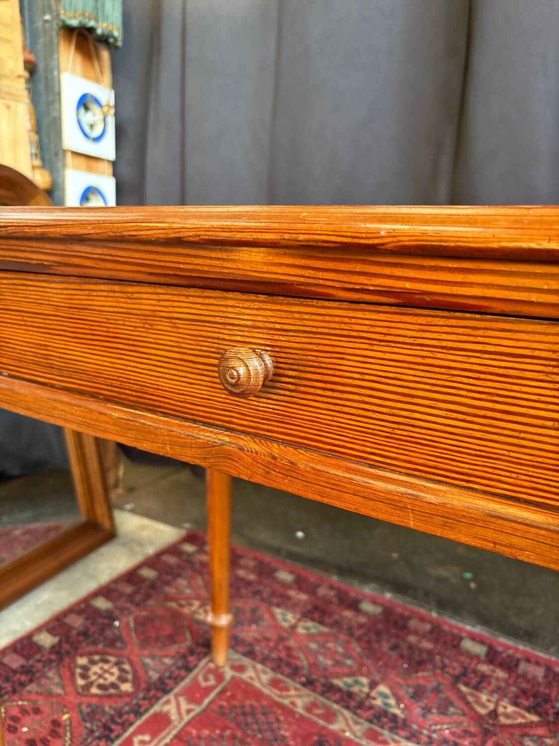 Small solid wood desk with a drawer.