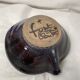 Signed sandstone dish