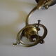 Wall lamps, opaque corolla and iridescent ochre lampshade, brass and wood support