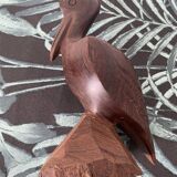 Carved wooden pelican. Dark wood.