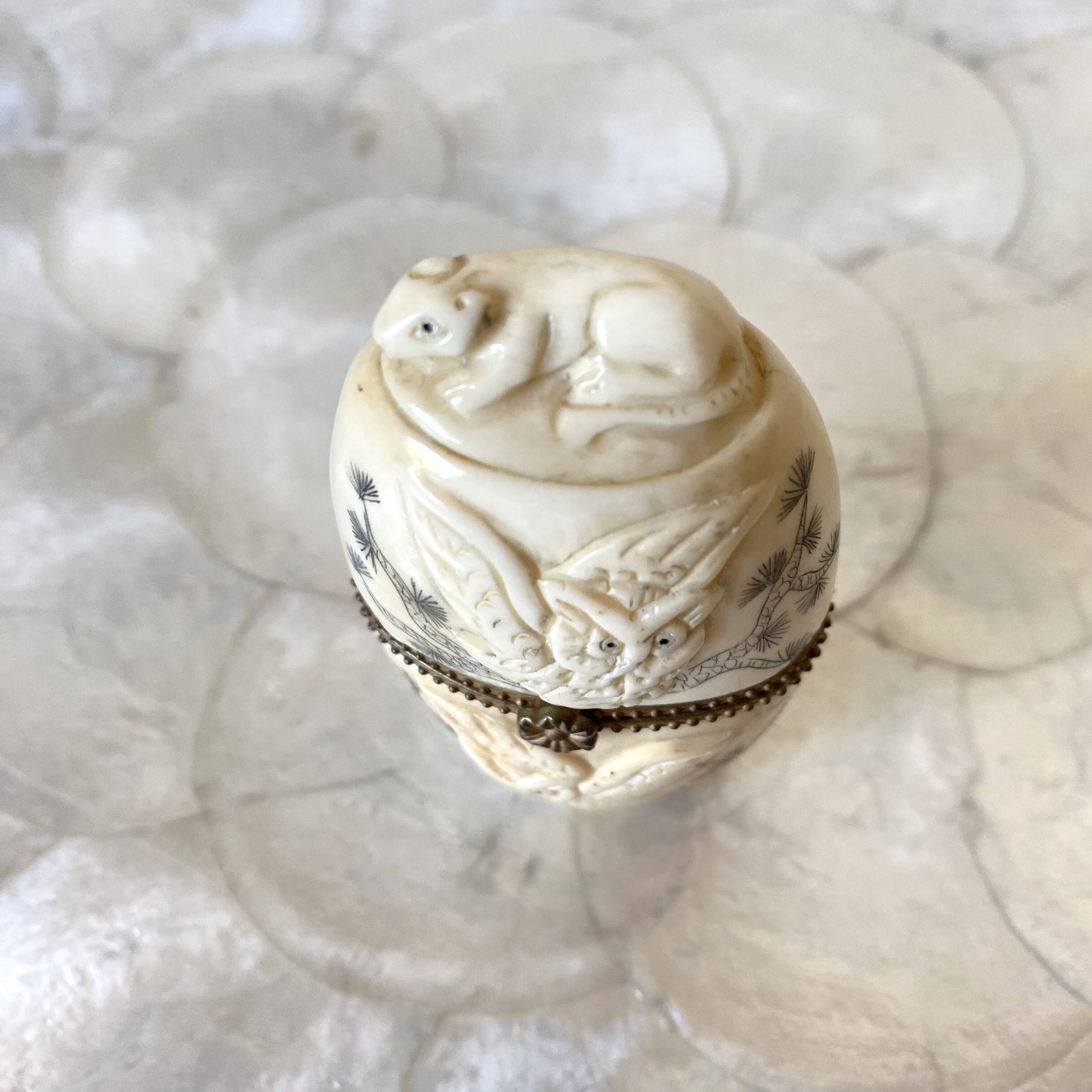 Ivory and brass owl and ermine box