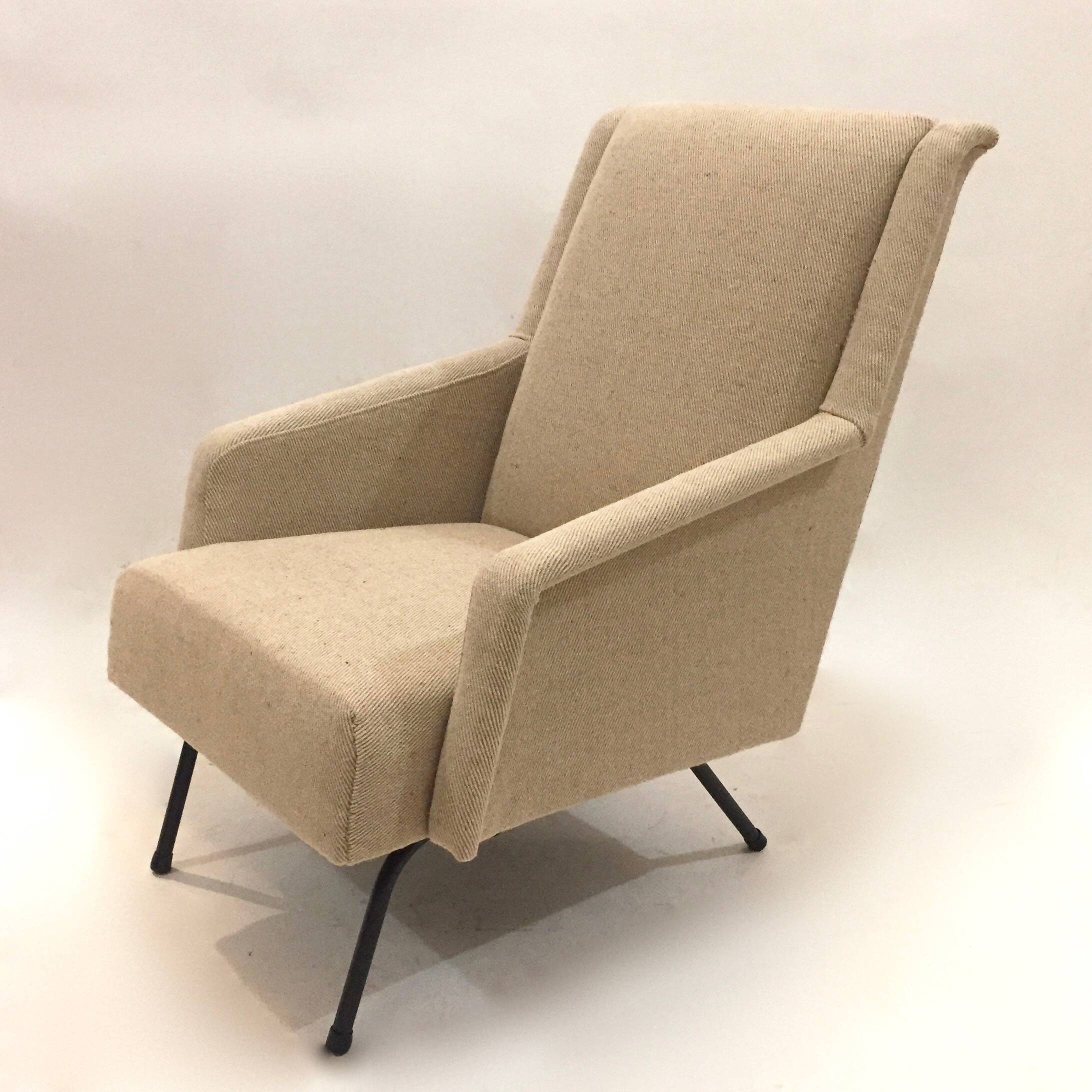 reupholstered modernist armchair