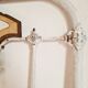 Cast-iron headboard and patinated white wood