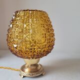 Bedside lamp in amber glass and brass