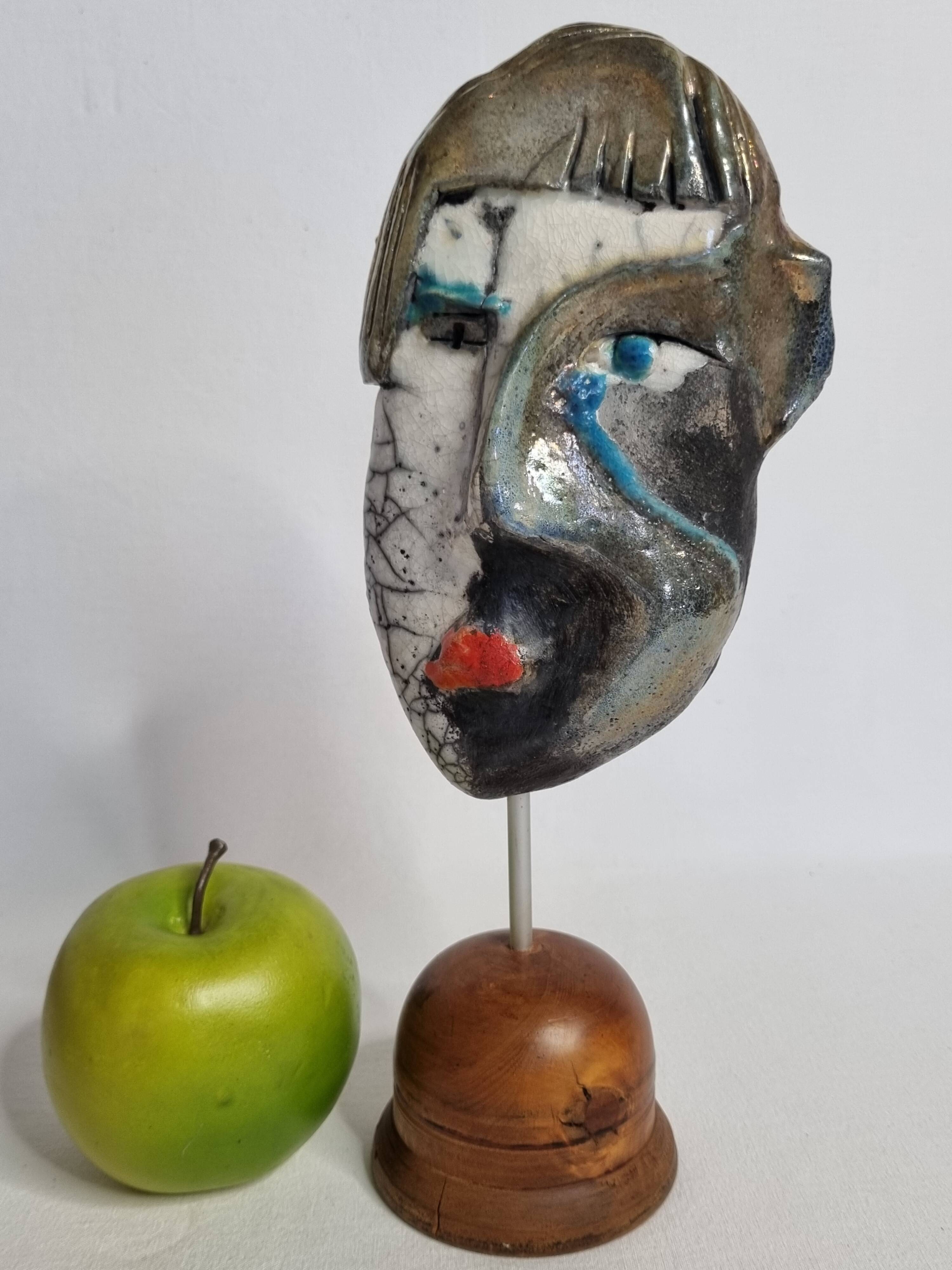 Signed raku ceramic mask on wooden base Contemporary sculpture 30 cm