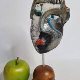 Signed raku ceramic mask on wooden base Contemporary sculpture 30 cm