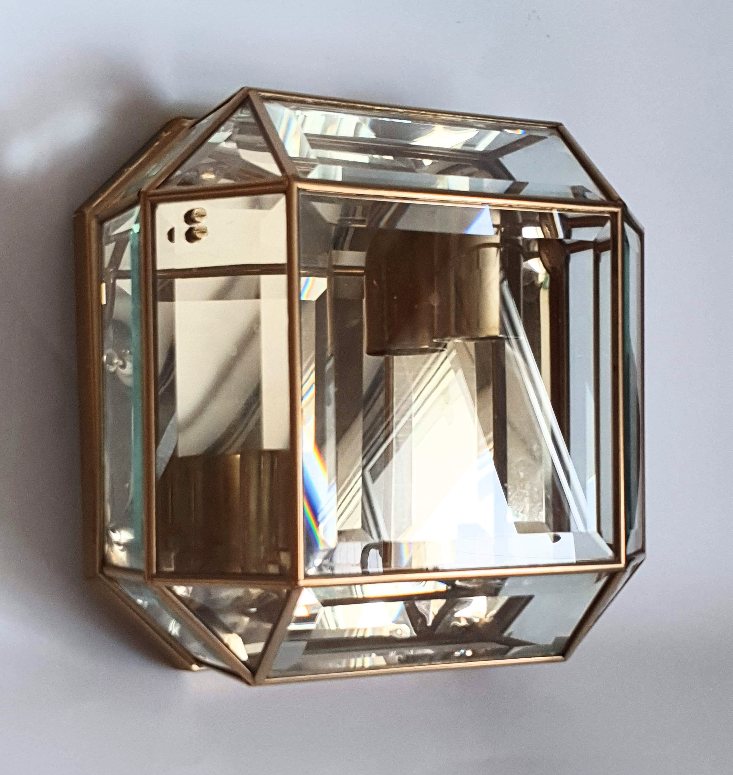 Brass wall lamp beveled glasses