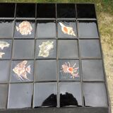 Vintage ceramic coffee table by Guy Trévoux with wrought iron base.