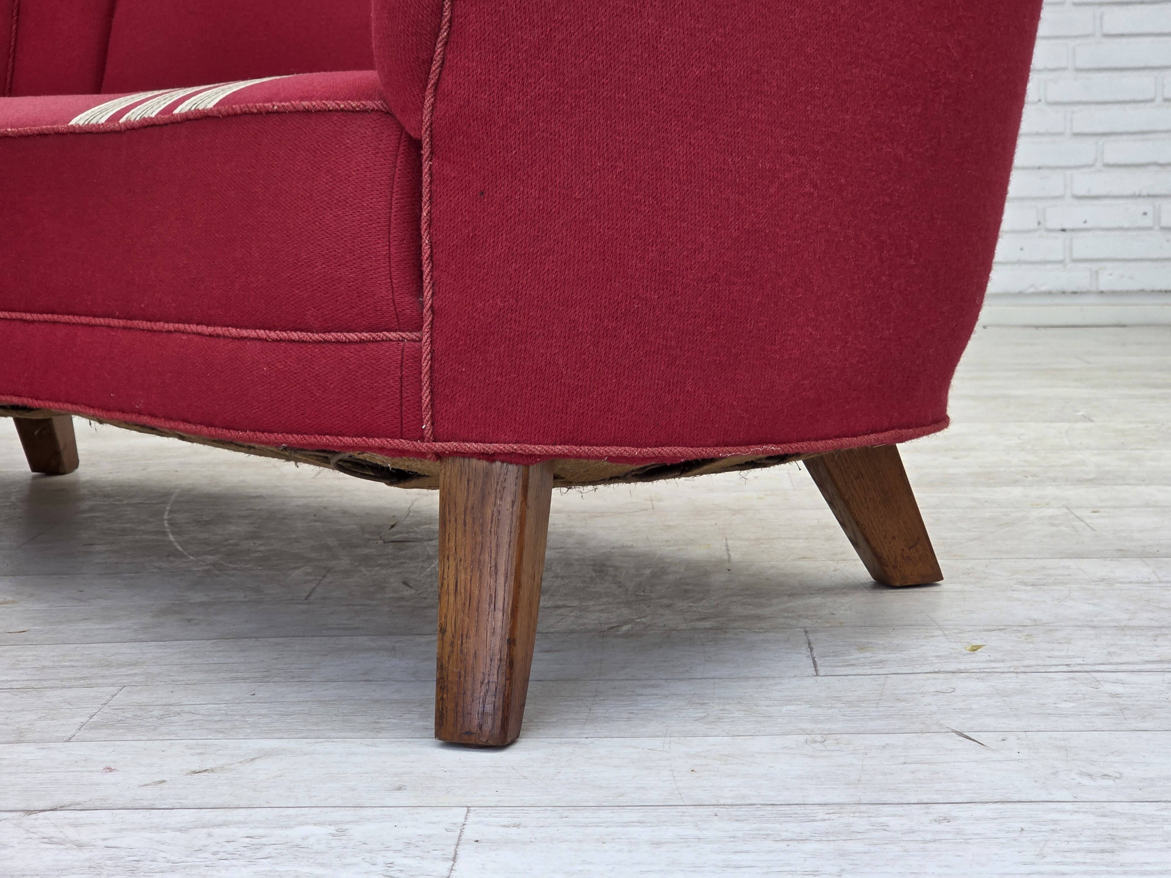 1960s, Danish 2-seater "Banana" sofa, furniture wool, oak wood legs.