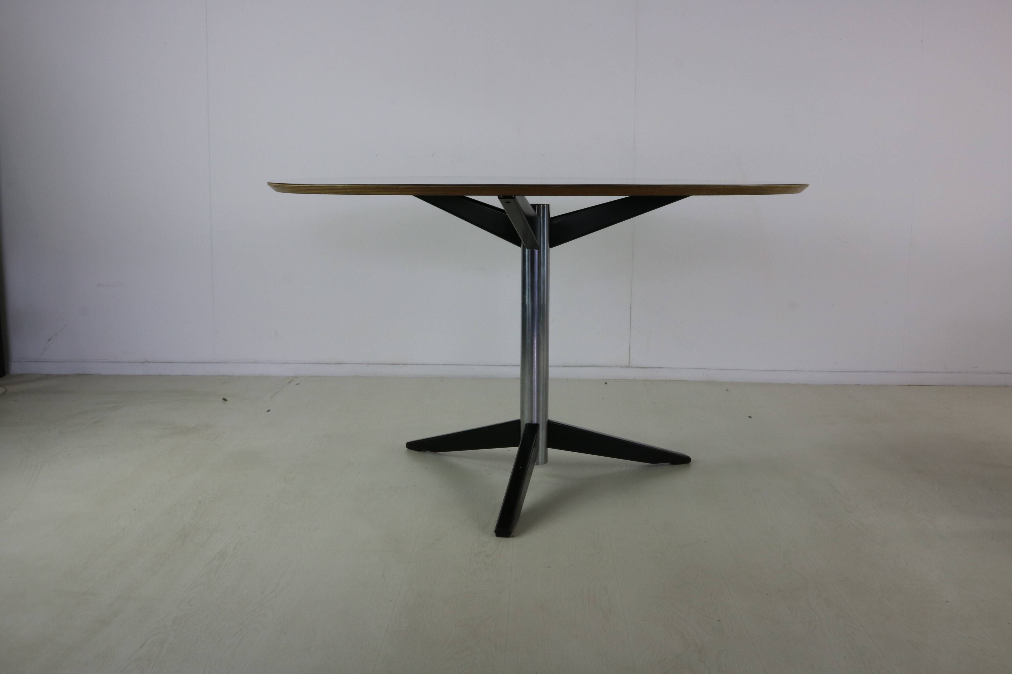 Sixties design round dining table by Martin Visser