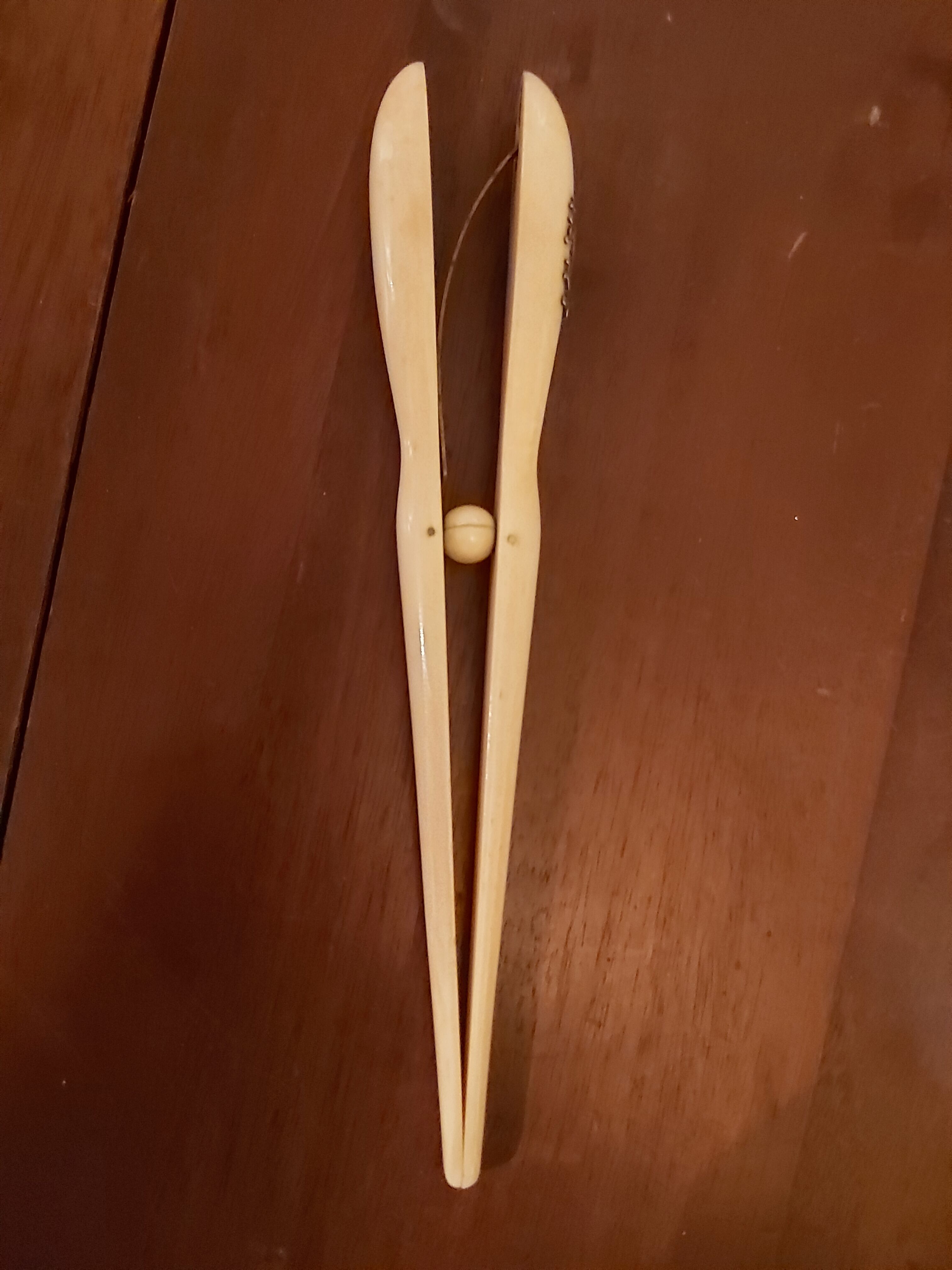 Ivory and silver glove clips