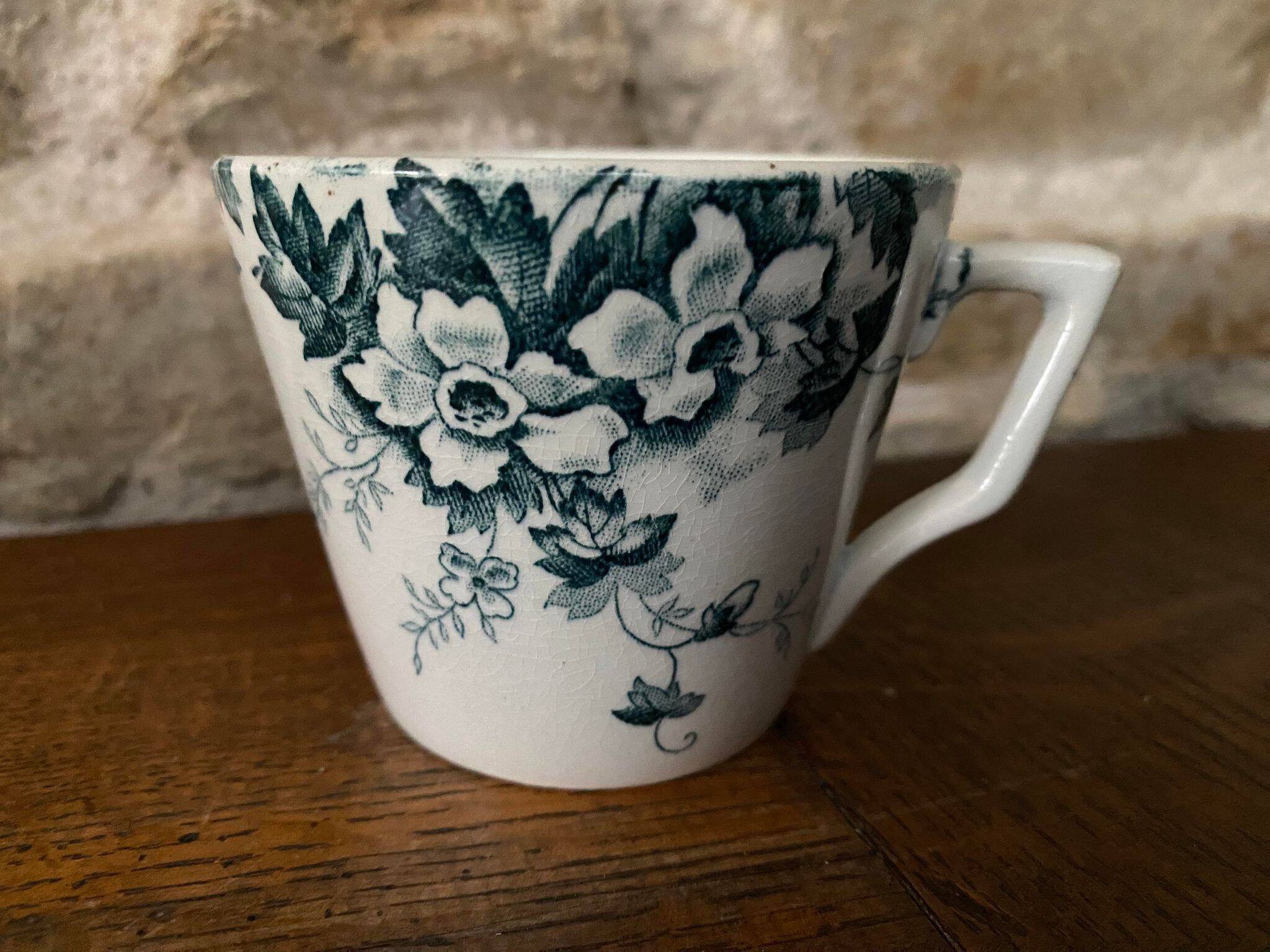 Cup and saucer in Iron Earth St Amand and Hamage Marie Louise