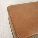 Cardboard and brown leather case