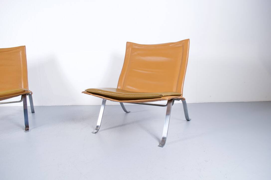 Imposing pair of leather and steel armchairs from the 1960s