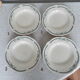 4 assiettes semi creuses terre de fer Longchamp