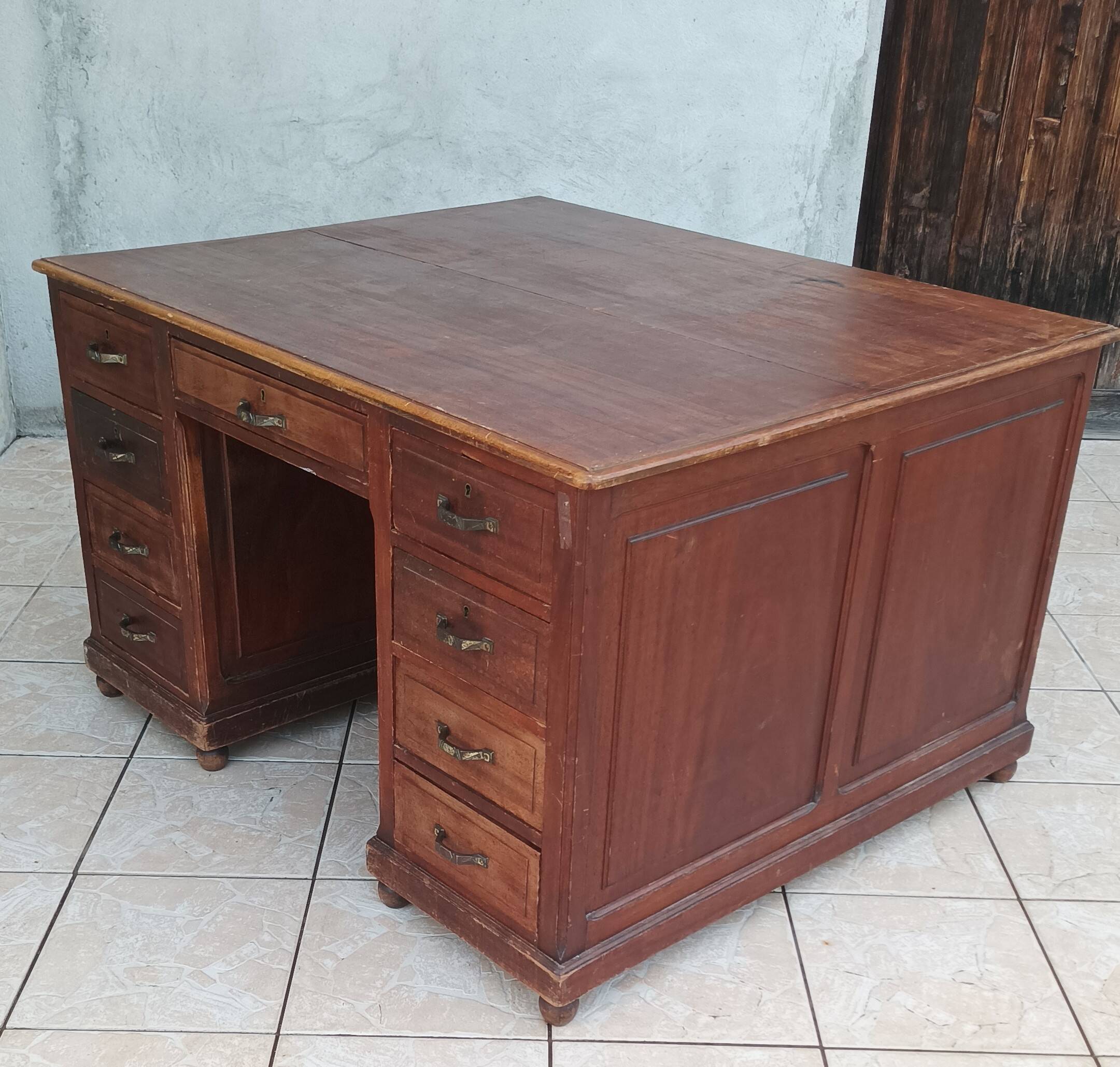 Vintage mahogany double-sided desk with 18 drawers