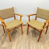 Pair of woven teak armchairs
