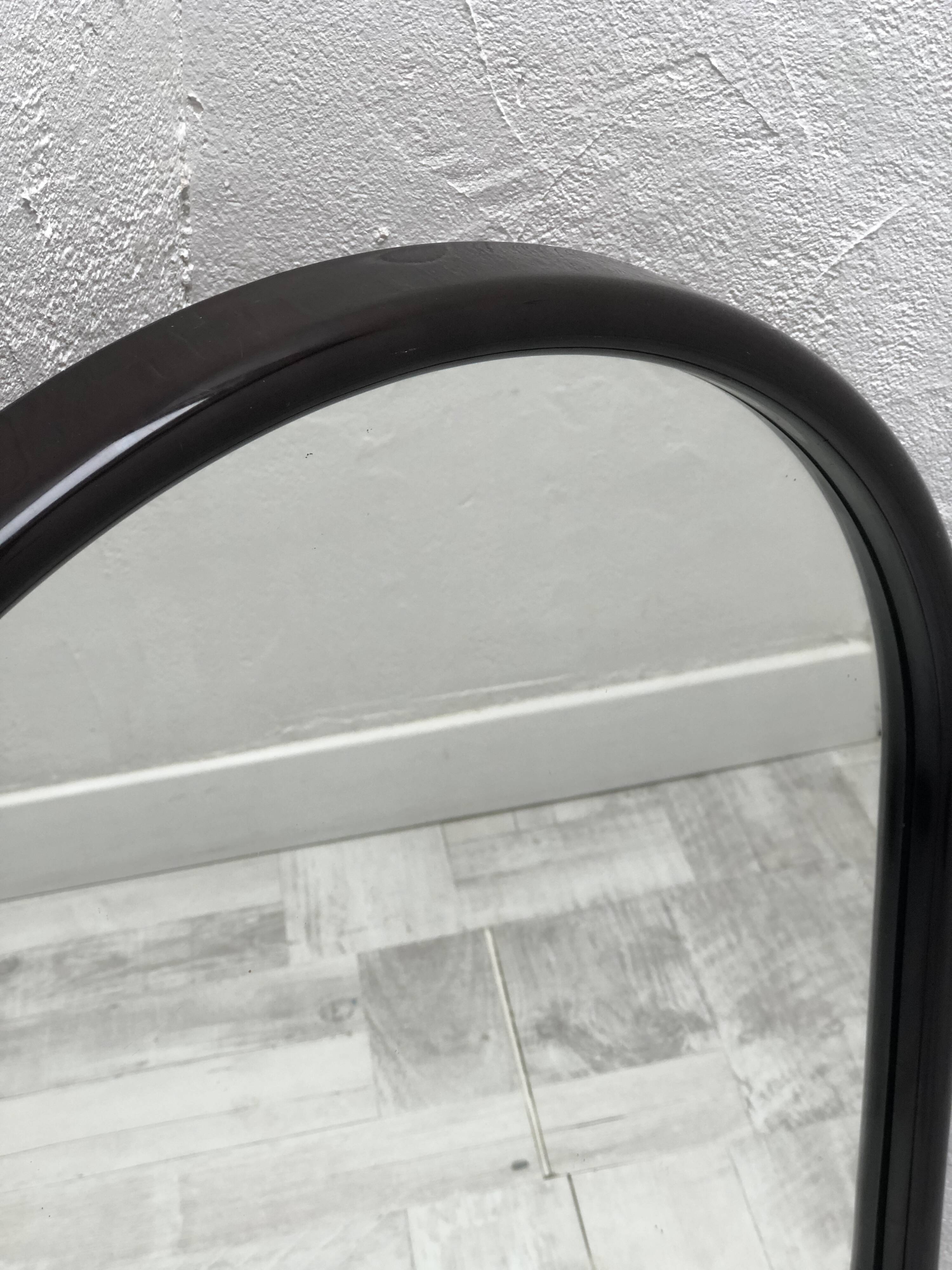 Brown plastic oval mirror, 1960s/1970s