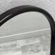 Brown plastic oval mirror, 1960s/1970s