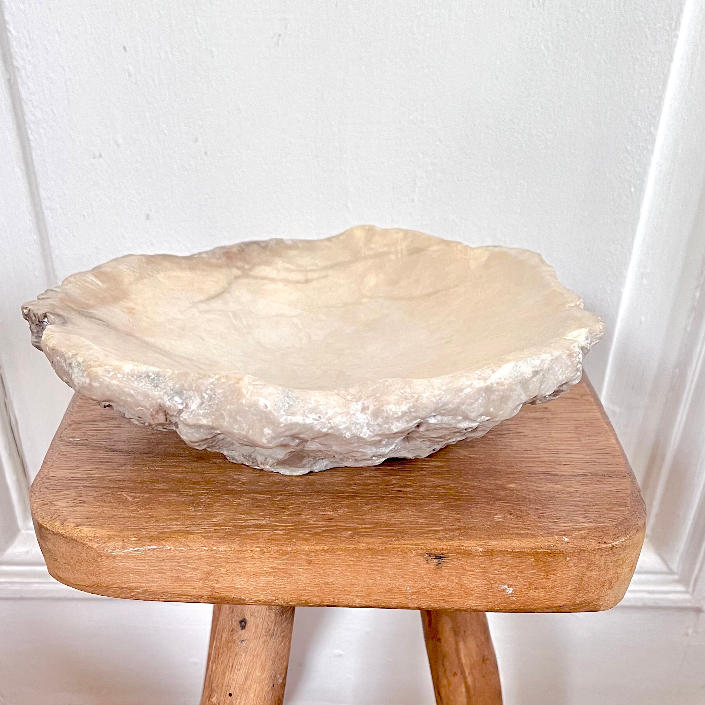 Large ashtray dish made of marbled alabaster.