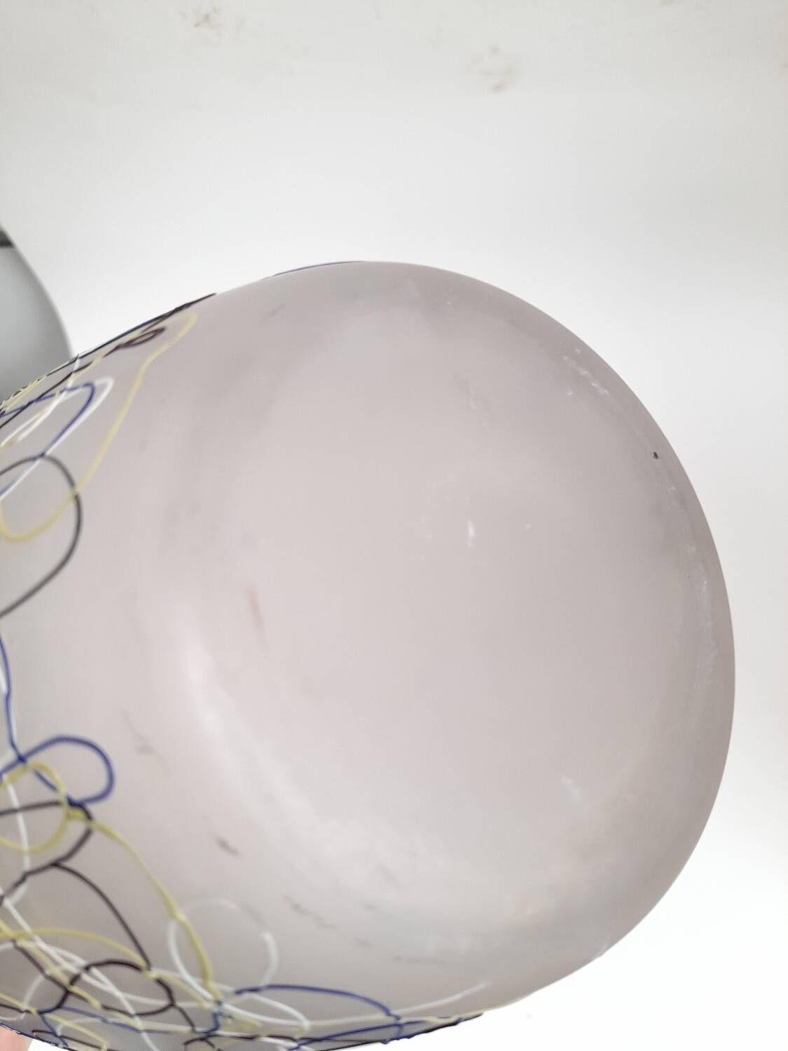 Large glass vase from Murano with coloured filaments.