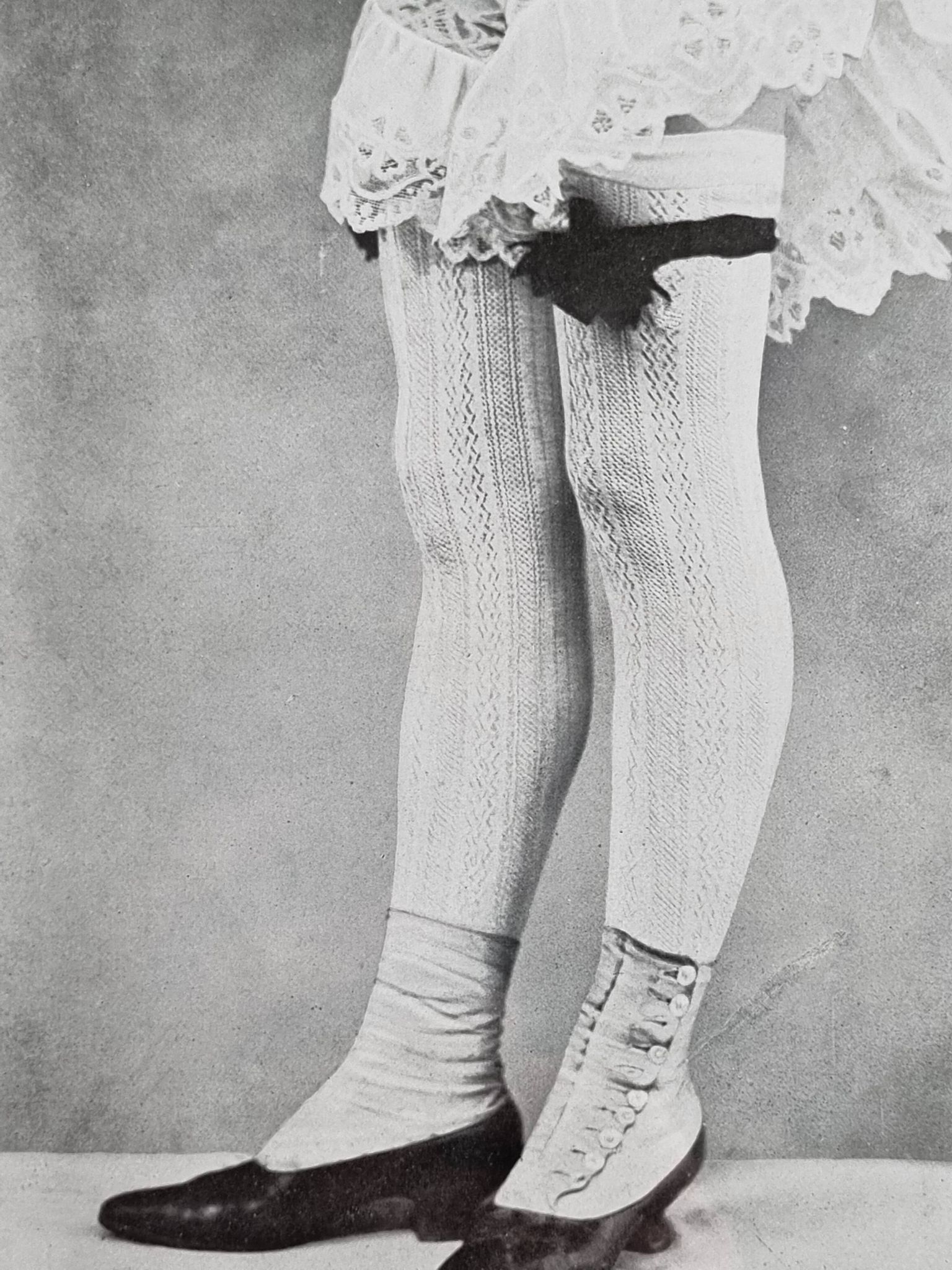 Original photogravure on glossy paper, Model in stockings and shoes 1900