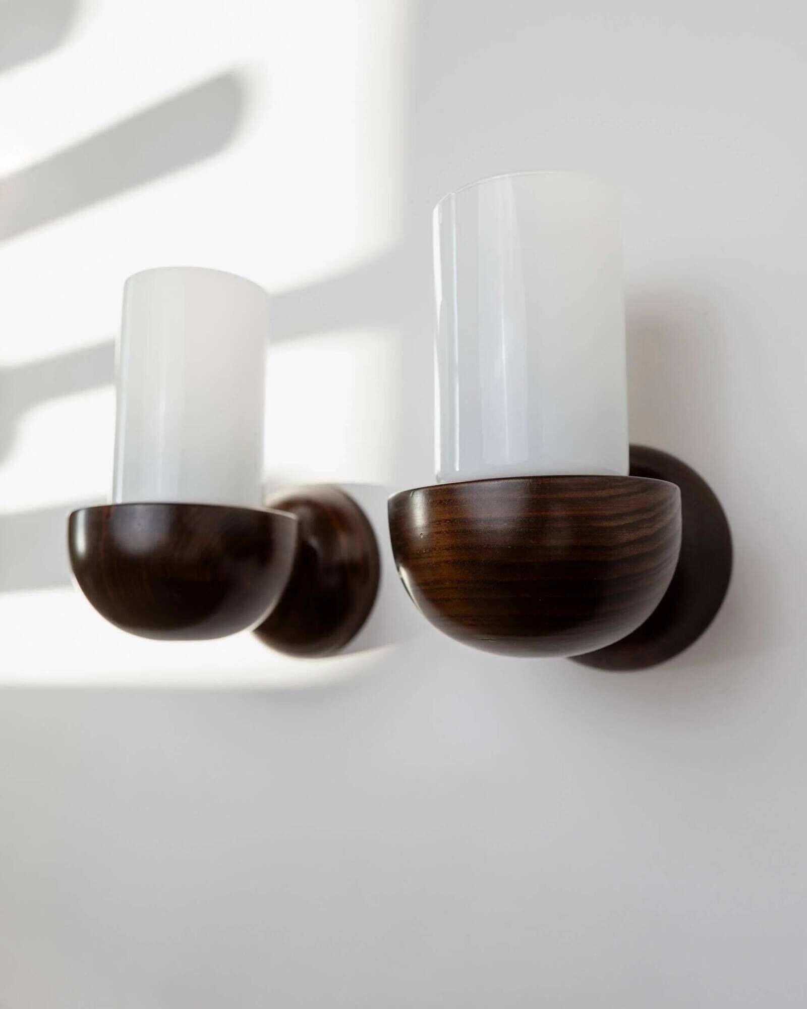 Vintage wall sconces from the 1960s, set of 2, dark wood with white glass shades, Mid-Century Modern lighting, sculptural wall sconces.