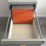 Three-drawer industrial grey metal filing cabinet with hanging backs