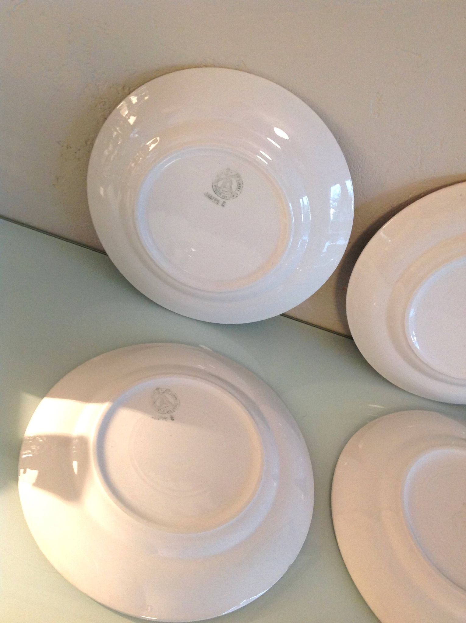 Set of six flat plates and one Moulin des Loups bowl, green tablecloth model/1950s-1960s