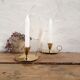 Pair of brass cellar rat candlesticks
