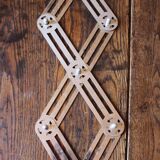 Vintage accordion folding metal trivet