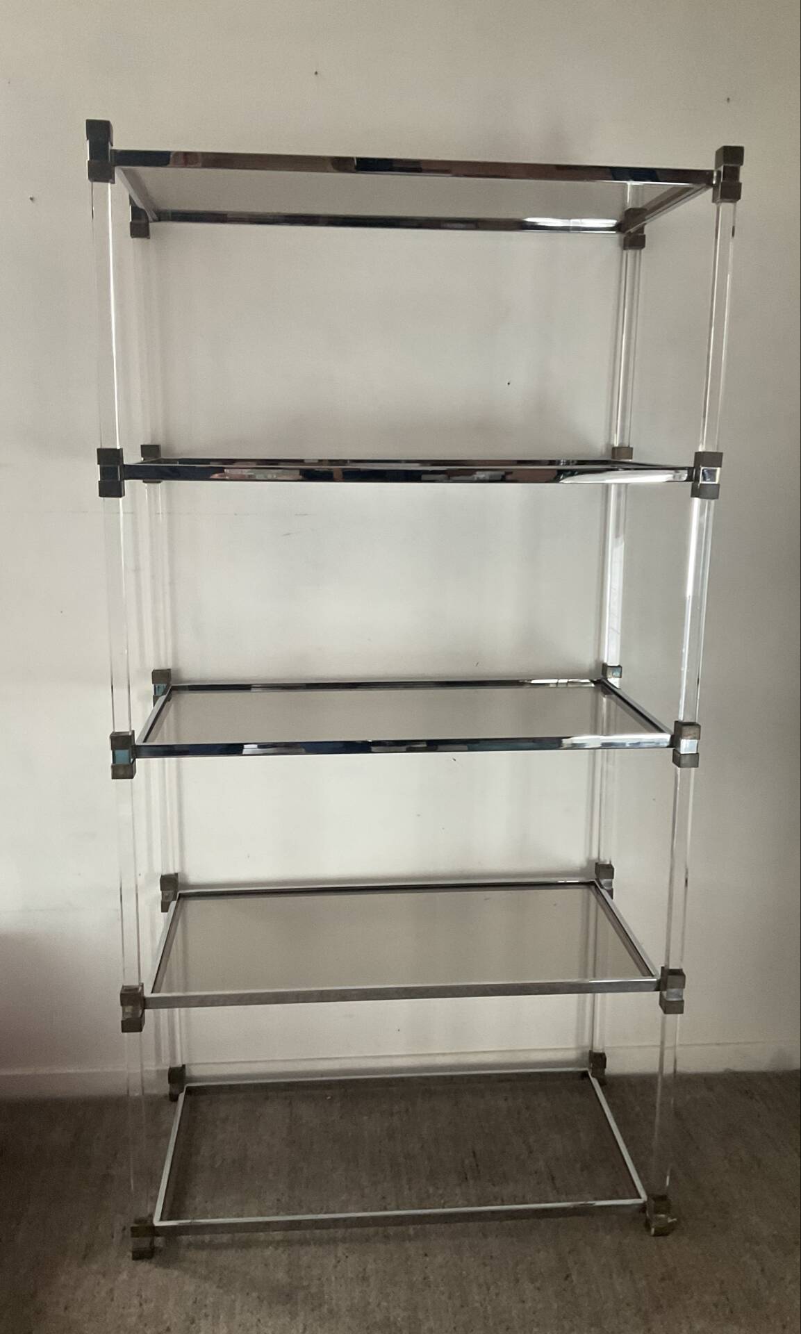 Vintage shelf in lucite, brass, and smoked glass from the 1970s.