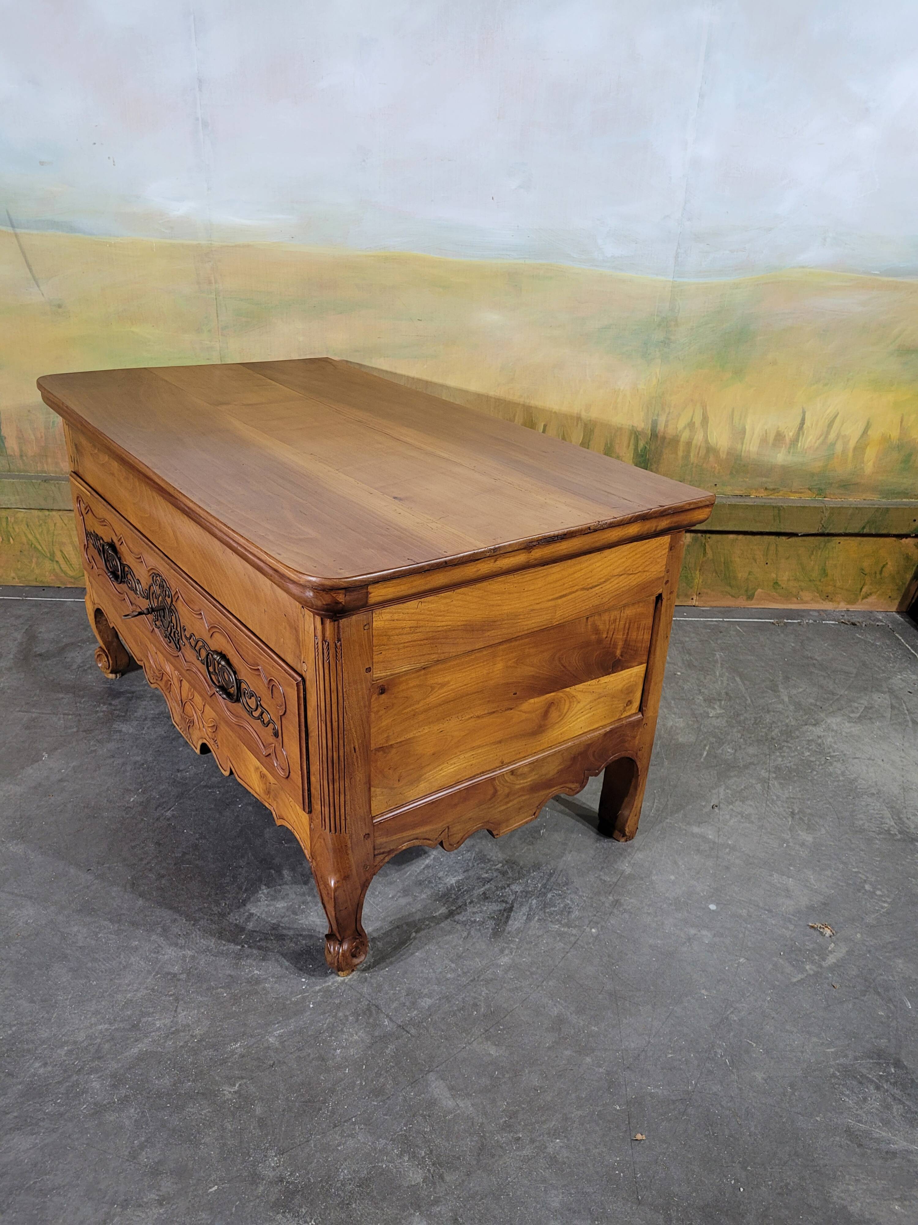 Louis XV low chest of drawers in solid cherry wood