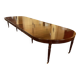 Extensible dining table from the Louis XVI period in mahogany with a banded top.