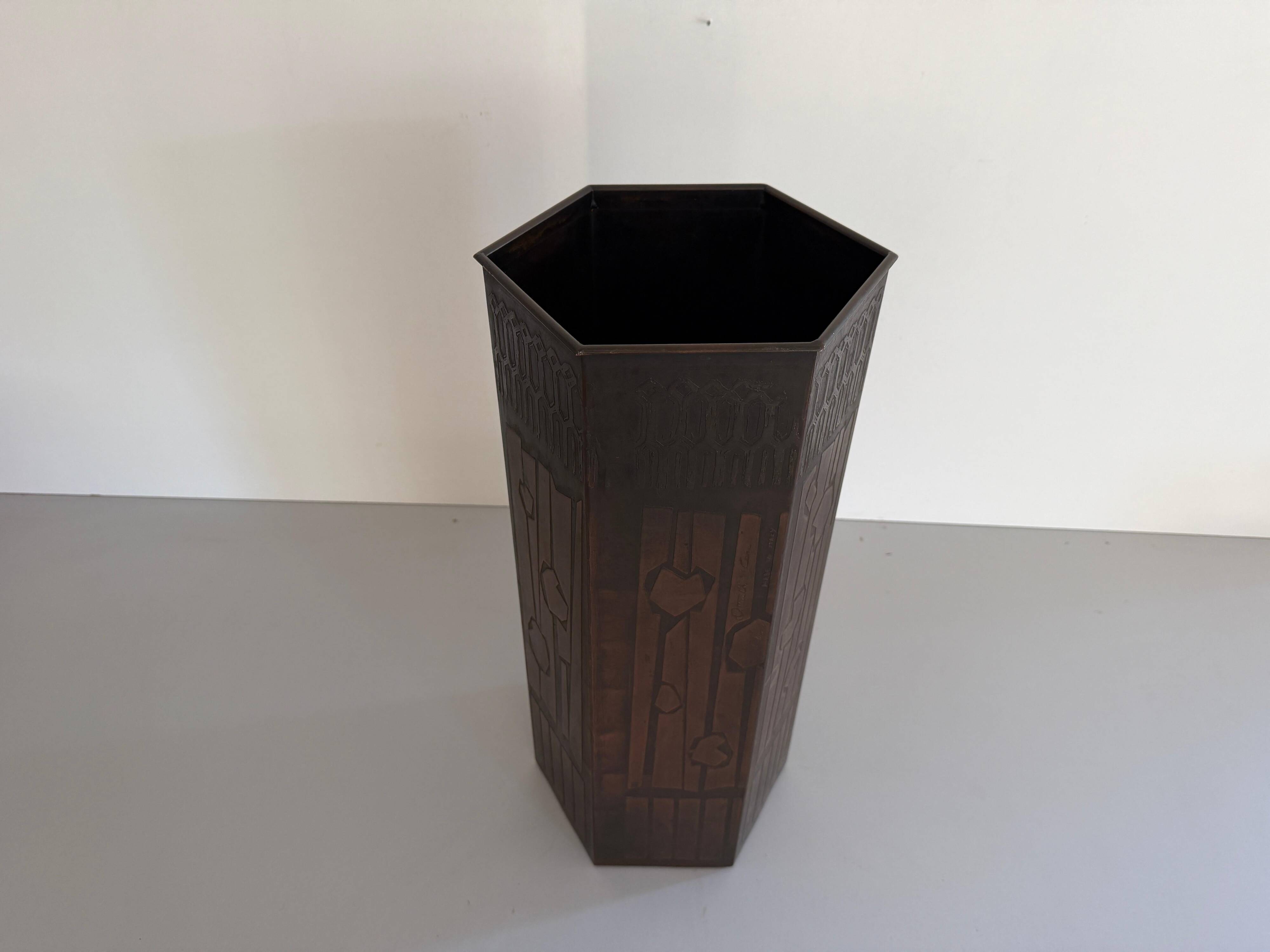 Hexagonal copper umbrella stand signed by the artist, 1960s, Italy.