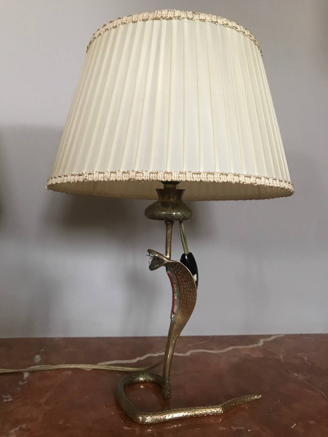 Magnificent pair of cobra bedside lamps