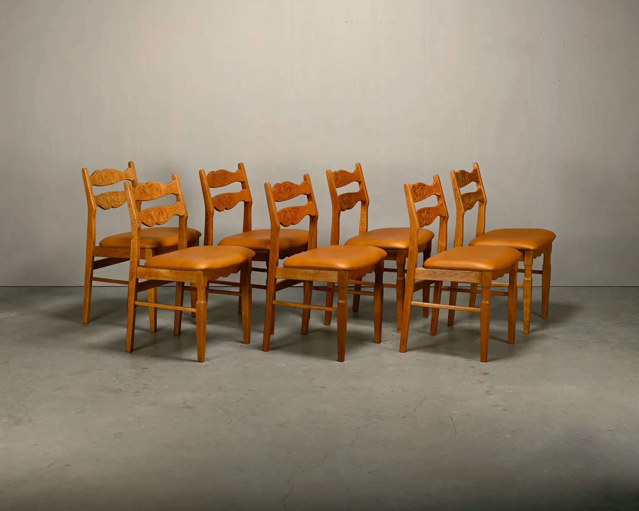 Razorblade style dining chairs by Henning Kjærnulf Oak and Leather Denmark