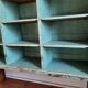 Old library shelf in patinated grocery tree