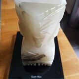 Onyx book clambands depicting an Aztec statue