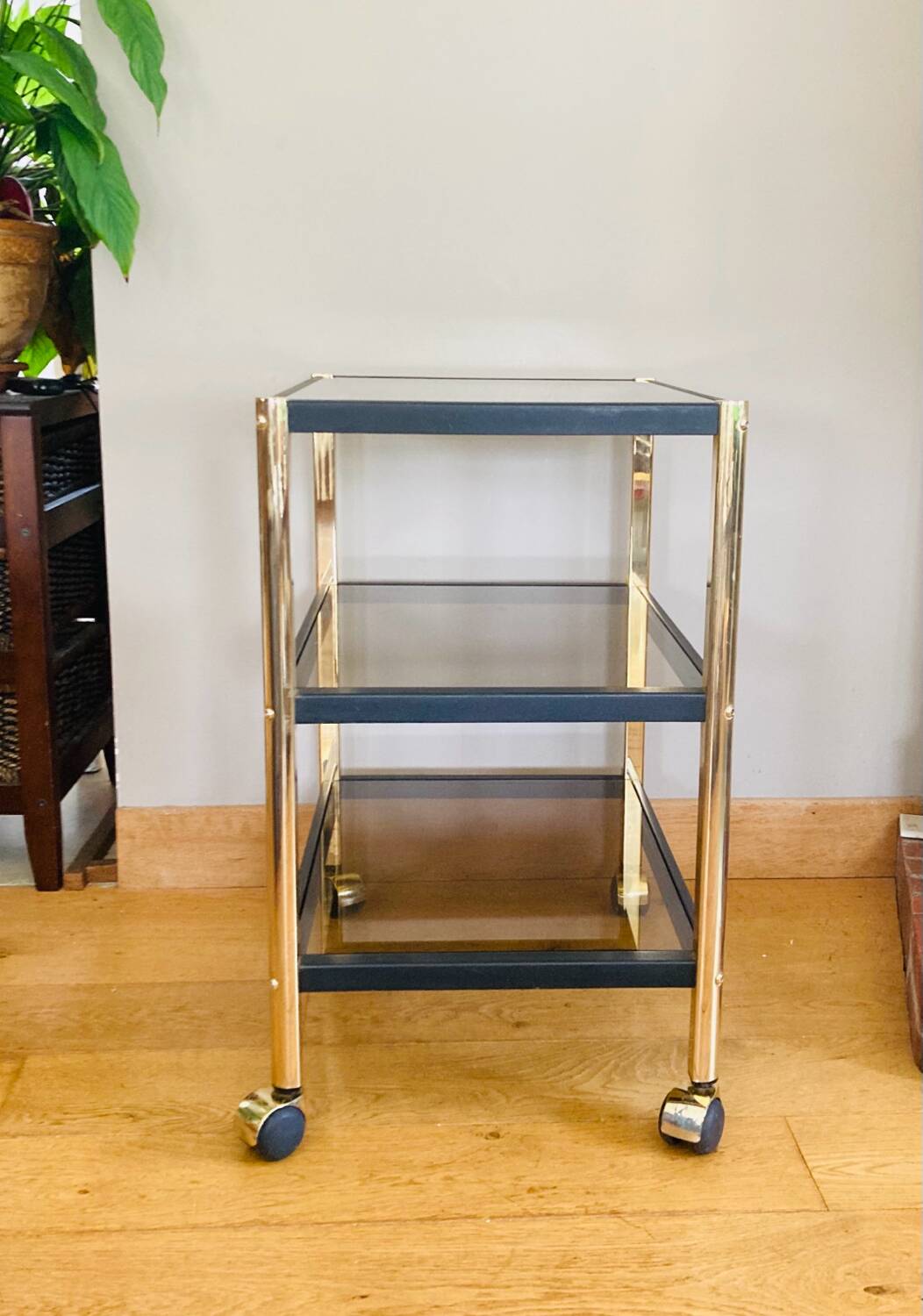 Side table in gold metal and smoked glasses 1970s