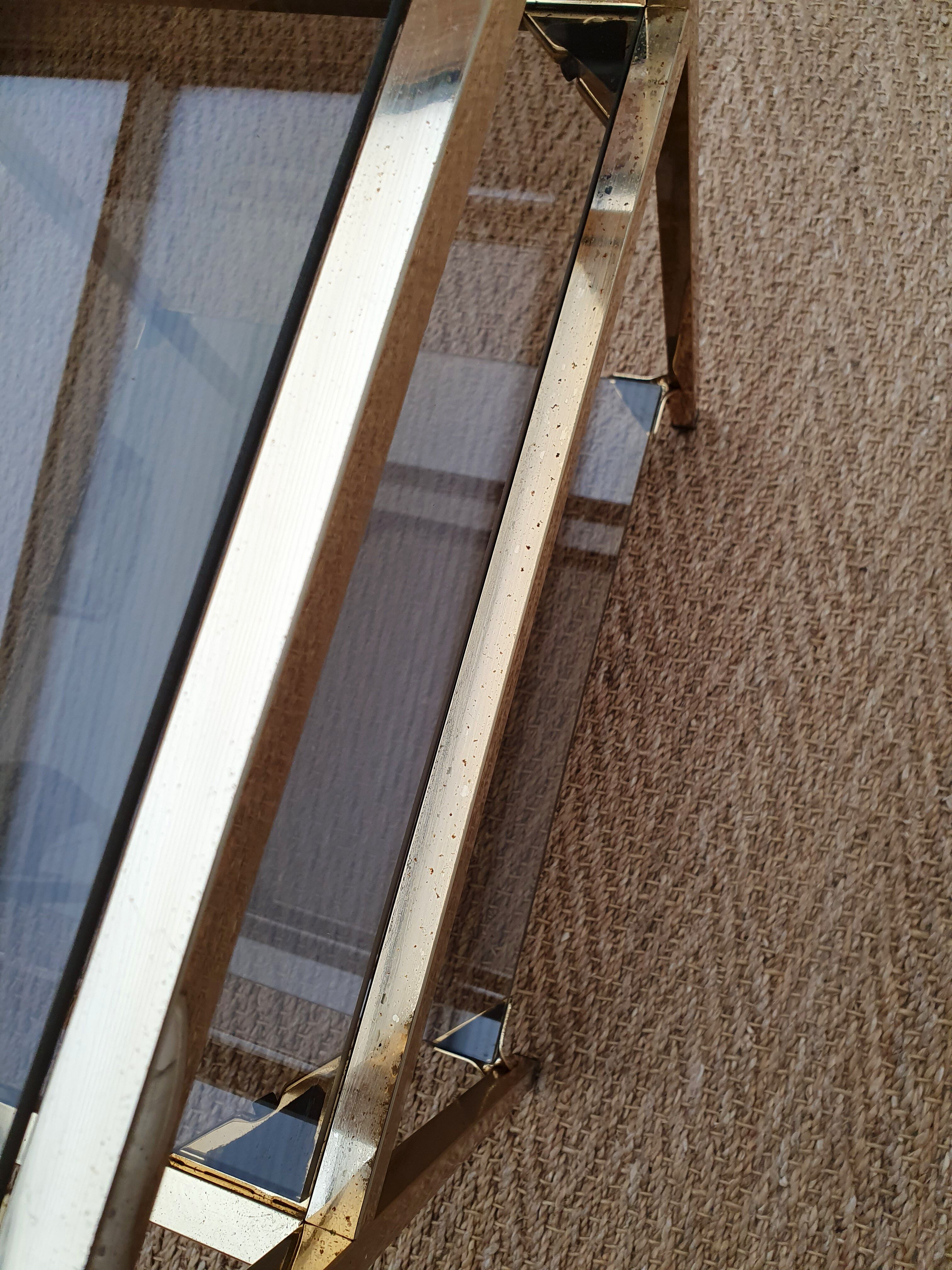 Side table gilded metal and smoked glass