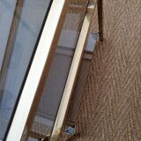 Side table gilded metal and smoked glass