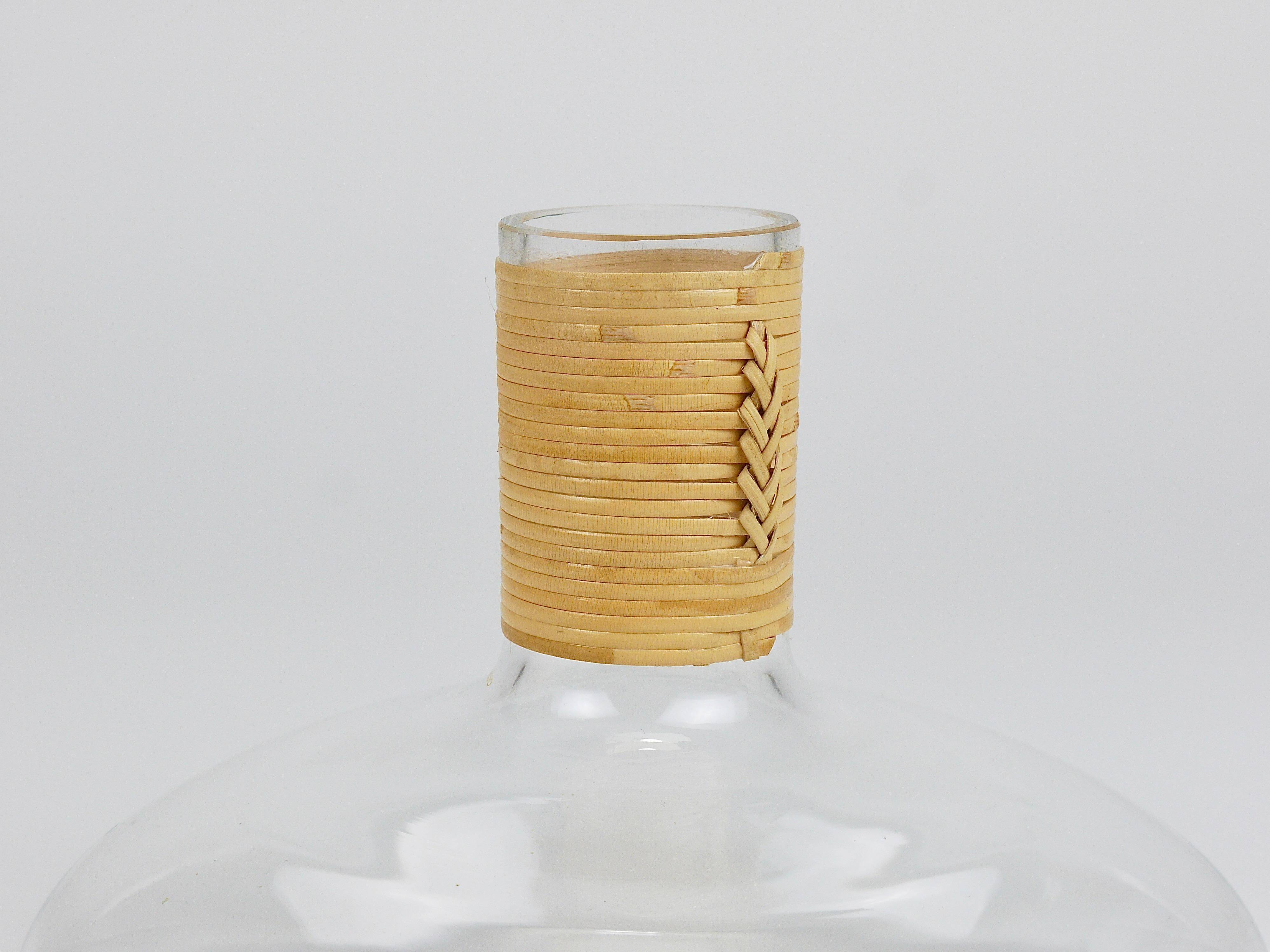 Vase by Carl Auböck decanter "Tuberkulinkolben" tall in rattan, Austria, 1950s.