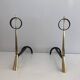 Pair of modernist bronze and wrought iron andirons