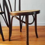 4 antique curved wood and cane chairs