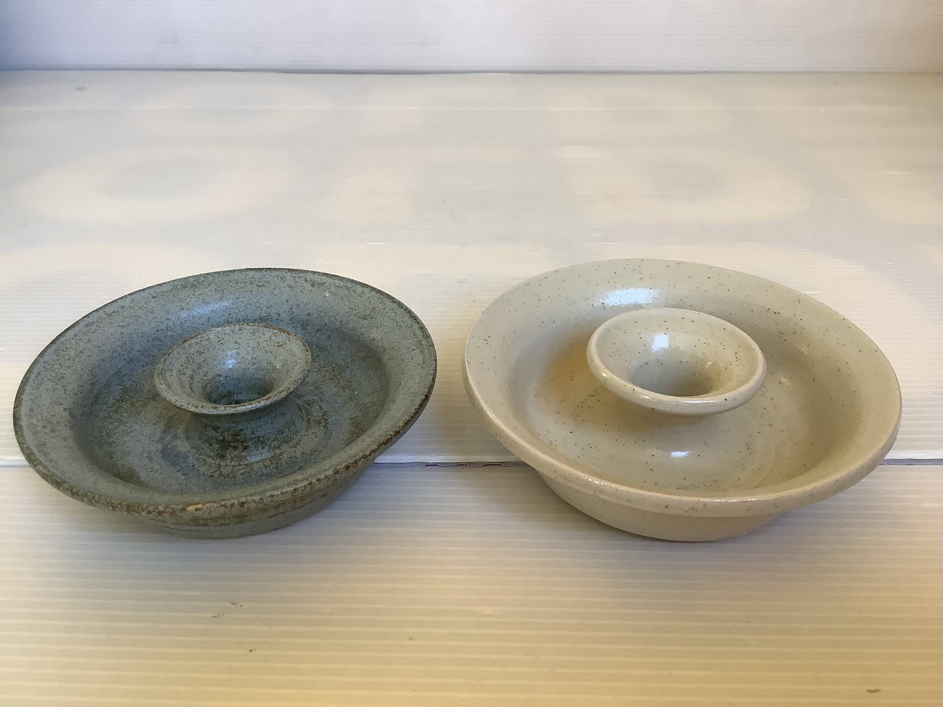 Pair of beige and blue ceramic candlesticks