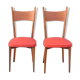 Two red vintage chairs