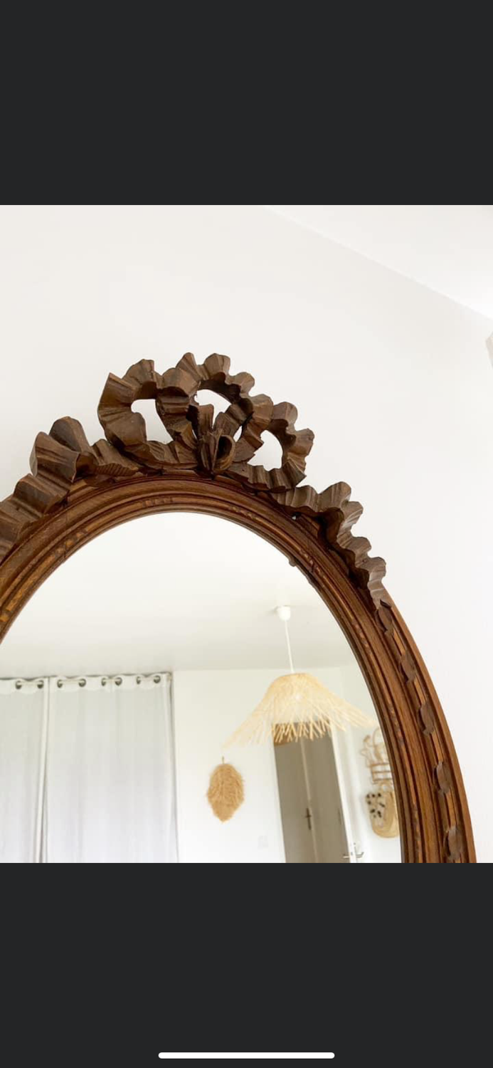 Louis XVI style oval knot mirror